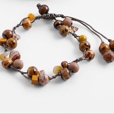 Nwt. Zara Two Brown Beaded Bracelets. #10 Casual Brown Bracelet Jewelry, Adjustable Beige Beaded Bracelets With Colorful Beads, Beige Wooden Beaded Bracelets, Brown Beaded Bracelets With Natural Stones For Beach, Brown Natural Stone Beaded Bracelets For Beach, Brown Natural Stones Beaded Bracelets For Beach, Casual Brown Beaded Necklaces With Colorful Beads, Brown Beaded Bracelets With Natural Stones, Earthy Brown Beaded Bracelets With Round Beads