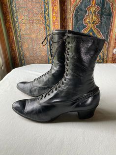 These classic suffrage era shoes are in marvelous shape for their age. With a profile of an ankle high bootie, the lace up, pointed toe styling is identified as a "must have" for authentic women's costuming for historic correctness. I find both shoes to be in comfortable, wearable condition. The soft leather has significant wear on the tongue, but still laces well and feels comfortable to use. It fits my size 7.5 generously, although I do have a naturally slim foot and would call them a "narrow" size. The real stacked leather heel and heavy leather sole also have significant wear, with one shoe probably needing repair within a season of use. If used for rare costume dates (my recommendation for antique leather)  these shoes should last through quite a few fantastic dressy events. Historical Formal Boots With Leather Sole, Victorian Boots With Leather Sole For Formal Wear, Victorian Formal Boots With Leather Sole, Formal Victorian Boots With Leather Sole, Victorian Boots With Leather Sole, Historical Round Toe Boots For Formal Occasions, Historical Formal Boots With Round Toe, Historical Round Toe Formal Boots, Victorian Almond Toe Fitted Boots