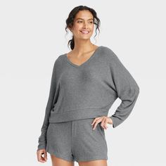 Stay effortlessly comfortable as you lounge around the house in this Cozy Ribbed Pullover from Auden™. Made from lightweight, super-comfy soft-brushed rib fabric with spandex, this long-sleeve pullover top hits at the hip. Designed with a V-neck and a relaxed fit, it's sure to be your new fave lazy-day pick. Auden™: Comfort true to every shape & hue. Comfy Super Soft Sweater For Loungewear, Comfortable Soft Knit Tops For Loungewear, Relaxed Cozy Fit Tops For Loungewear, Soft Knit Sweater For Loungewear, Snug Tops For Fall Loungewear, Cozy Tops For Loungewear, Snug Tops For Loungewear In Fall, Comfortable Knit Sweater For Loungewear, Comfortable Knit Sweater For Casual Use