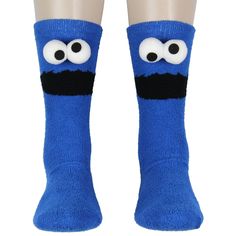 Step into the whimsical world of Sesame Street with the Cookie Monster 3D Eyes Chenille Fuzzy Crew Socks, where fun meets cozy in a one-of-a-kind fashion statement. These aren't just socks; they're a plush tribute to one of the most beloved characters from the neighborhood of Sesame Street—Cookie Monster! Adorning these fuzzy wonders is the endearing face of the cookie-loving monster himself, complete with his amazing wide-eyed gaze. What sets these socks apart is the imaginative use of 3D plush Playful Super Soft Socks For Playtime, Cute Super Soft Socks For Playtime, Non-slip Blue Socks For Winter, Blue Non-slip Casual Socks, Soft Comfortable Blue Socks, Comfortable Socks For Winter Playtime, Soft Blue Comfortable Socks, Comfortable Winter Socks For Playtime, Casual Blue Non-slip Socks