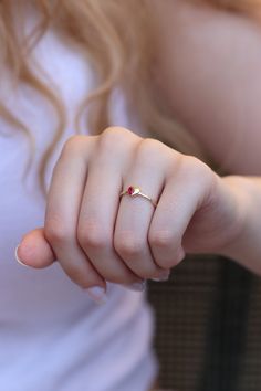 "Handmade Gold Heart With Natural Ruby / 14k 18k Gold Genuine Ruby Ring Available in Gold, Rose Gold and White Gold / July Birthstone ❥ ITEM DETAILS ---> Gold Color of Choice : Yellow Gold, Rose Gold, White Gold ---> Material : 14k ( 585 ) or 18k ( 750 ) Real Gold. It is Not Gold Filled or Gold Plated ---> Made to order ---> Band Thickness : 1.20 mm ---> Band Width : 1.30 mm ---> Ruby Cut: Pear Shape Ruby ---> Number of Stones: 1 Pear Shape Ruby ---> Total Carat : 0.20ct 14k Gold Heart-shaped Proposal Jewelry, Dainty 14k Gold Birthstone Ring For Proposal, Valentine's Day Jewelry With Bezel Setting, Heart-shaped 14k Gold Birthstone Ring, Heart-shaped Rose Gold Solitaire Jewelry, Heart Shaped Rose Gold Solitaire Jewelry, Rose Gold Heart Solitaire Jewelry, 14k Gold Heart-shaped Solitaire Ring, 14k Gold Heart-shaped Ruby Promise Ring