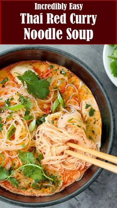 a bowl filled with noodles and garnished with cilantro, parsley and herbs