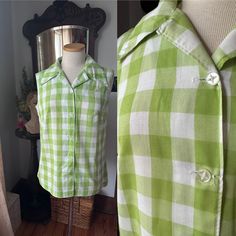 1970s Green Gingham Blouse, 70s Green Shirt, 1960s Green Gingham Blouse, Vintage Summer Shirt, 70s Casual Blouse, Button Down Shirt, Spring Sweet green gingham blouse. This looks to be masterfully handmade. No tags inside. The style of this shirt could be from the 1960s to 1970s era. Such a lovely spring through summer blouse. Overall, excellent vintage condition with no glaring flaws.  Measurements - - -  Bust: Waist: Length from top of shoulder to hem: All sales are final. Vintage Plaid Spring Tops, Vintage Plaid Top For Spring, Vintage Cotton Top For Picnic, Retro Plaid Shirt For Summer, Vintage Gingham Blouse For Spring, Spring Vintage Gingham Blouse, Retro Plaid Tops For Spring, Retro Plaid Collared Tops, Vintage Gingham Summer Blouse