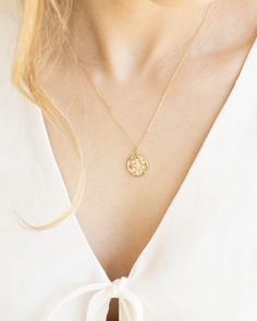 Indulge in celestial vibes with our Celeste Necklace. The gold medallion coin adds a touch of old money luxury while the celestial stone detailing adds a mystical touch. Perfect for adding a touch of gold to any outfit. Details: -Gold Filled -18" length -Waterproof, tarnish free, hypoallergenic -Bright White CZ Stones Old Money Luxury, Money Luxury, Gold Medallion, Pearl Collection, Touch Of Gold, 50th Gifts, Fine Jewelry Gift, Cz Stone, Outfit Details