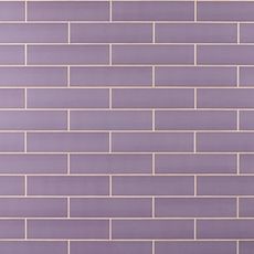 a purple brick wall that is very clean