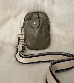 Real Leather Green Mobile Bag Crossbody bag Olive green Phone pouch Bag Khaki Green Phone purse With 2 Straps-Silver Hardware Gifts for her All you want to know about this bag: Silver colour hardware Front pocket with magnetic closure Top zip closure Adjustable and detachable long strap Material: Real leather Dimensions: 13 cm(L) x  2 cm(W) x 19.5 cm(H), drop of strap: 54 cm Green Rectangular Pouch For On-the-go, Green Rectangular Phone Bag With Detachable Strap, Green Crossbody Shoulder Bag, Green Rectangular Phone Bag For Daily Use, Green Rectangular Travel Pouch, Rectangular Green Travel Pouch, Green Satchel Shoulder Bag With Mobile Phone Holder, Green Portable Satchel Shoulder Bag, Portable Green Satchel Shoulder Bag