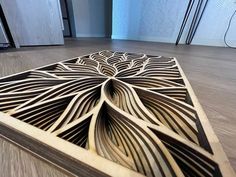 an intricate wooden design on the floor