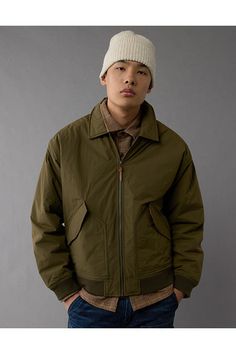 Collared neck/Full zip-up front/Front pockets with snap closures/Ribbed cuffs & hem Casual Khaki Outerwear With Zipper Closure, Collared Outerwear With Ribbed Cuffs For Streetwear, Solid Color Outerwear With Zipper Closure And Stand Collar, Urban Outerwear With Ribbed Cuffs For Spring, Winter Workwear Windbreaker With Pockets, Urban Outerwear With Padded Collar For Cold Weather, Urban Winter Outerwear With Pockets, Casual Outerwear With Stand Collar And Flap Pockets, Casual Solid Outerwear With Flap Pockets