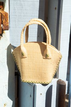 Kaki and natural raffia bag. The Gigi is your best ally for all occasions ! As a beach bag, a city basket or an evening purse to dress up your outfit, the Gigi is fit for all occasions and for all women. This trendy raffia bag is handmade in the purest tradition of raffia weaving. Carry by hand or at the shoulder, it is therefore the perfect fashion accessory ! But that's not all ! The Gigi aims to embellish your daily life every season with positivity and kindness throughout lithotherapy. That' Raffia Bag Outfit, Bag Outfit, Raffia Bag, Evening Purse, Natural Red, Cloth Bags, Beach Bag, Daily Life, Straw Bag