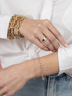 Elevate your jewelry collection with our 14k Gold Cigar Band—an effortlessly chic, flat 5mm gold band designed for the modern woman who values timeless elegance and versatility. Crafted from high-quality 14k gold, this sleek statement ring embodies minimalist sophistication, perfect for stacking or wearing solo for a bold look. Whether you’re heading to a work meeting, a weekend brunch, or a holiday party, this cigar band seamlessly enhances your style with a luxurious yet understated touch. Mad Statement Gold Ring, Dainty Gold Jewelry, Work Meeting, Breaking Up, Dainty Bracelet, Weekend Brunch, Initial Jewelry, Dainty Bracelets, Layered Bracelets