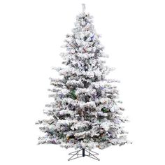 a white christmas tree with snow on the top and bottom branches, in front of a white background