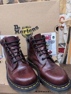 The Dr Martens 939 model is a close resemblance to a traditional hiking style boot. Six holes in height, it reaches just above the ankle and has a leather padded collar for extra comfort. They are finished in a very good analine Burgundy leather. Strong, comfortable and very durable. With the trademark cushioned some, they are the perfect everyday boot. They are a UK size 4, European 47, USA ladies 6 Steel Toe Lace-up Boots For Streetwear, High Ankle Lace-up Boots For Outdoor With Leather Footbed, Rugged Round Toe Boots For Streetwear, Lace-up Steel Toe Boots For Streetwear, High Ankle Hiking Boots With Reinforced Toe For Fall, Brown High Ankle Work Boots With Reinforced Toe, Brown Ankle-high Work Boots For Streetwear, Round Toe Boots For Streetwear With Lacing, Brown Ankle Work Boots