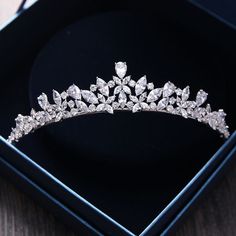 a tiara in a black box on a table