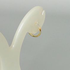 12mm sterling silver endless ear hoops, dipped in gold. Size: 1.5 x 12 mm These earrings are made of real 925 hypoallergenic sterling silver, dipped in real gold. Will be packaged in a gift box. Please let me know if you don't want it in one. I can write out a message from you to the receiver if needed. Please be free to contact me at... bhavnakwintra1956@gmail.com More hoops: https://www.etsy.com/your/shops/TheSilverGame/tools/listings/section:26305414 More earrings: https://www.etsy.com/your/s Simple Tiny Hoop Huggie Earrings, Simple Tiny Huggie Hoop Earrings, Dainty Small Hoop Single Huggie Earring, White Minimalist Huggie Hoop Earrings, Simple Huggie Cartilage Earrings With Ear Wire, Simple Adjustable Gold Cartilage Earrings, Simple Hypoallergenic Small Hoop Huggie Earrings, White Hoop Nose Rings Gift, Simple Huggie Hoop Earrings With Ear Wire