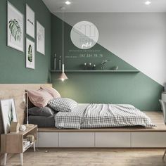 a bedroom with green walls and white furniture in the corner, along with pictures on the wall