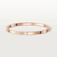 Introducing the LOVE BRACELET 3.65MM - a timeless and elegant piece that exudes sophistication and exclusivity. Crafted with the finest materials, this bracelet features a sleek 3.65mm design, perfect for adding a touch of luxury to any outfit. With its iconic design, this bracelet is the perfect way to show your love and appreciation. ADDITIONAL INFORMATION Color: Pink Gold, Silver, Gold Stone: No Ref. B6047317 Material:- 925 Sterling Silver - 18k Gold Plated- 10k Real Gold- 18k Real Gold ( con Trinity Bracelet, Rose Gold Fashion, Gold Bangles For Women, Detailed Jewelry, Love Bracelet, Gold Plated Bracelets, Silver Accessories, Elegant Accessories, Cartier Love Bracelet