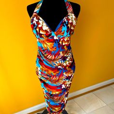 Brand New, Great Condition, Floral Halter Dress With Neck Tie Closure And Partial Back Out Detail, Back Zipper Closure, Side Ruching And Very Comfortable With Stretch Fitted Multicolor Floral Dress For Beach, Fitted Multicolor Floral Dress For The Beach, Tropical Multicolor Midi Dress With Floral Print, Multicolor Summer Cocktail Dress, Tropical Multicolor Midi Dress With Vibrant Print, Multicolor Floral Print Midi Beach Dress, Multicolor Floral Print Midi Dress For Beach, Fitted Floral Dress With Vibrant Print For Beach, Vibrant Floral Beach Dress Fitted