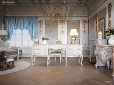 an ornately decorated living room with chandelier and table in the corner,