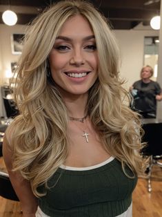 This layered look is the epitome of volume and bounce, perfect for blondes who want their hair to stand out. The layers give an added lift around the crown, making the hair look fuller and more glamorous. It’s ideal for anyone looking to combine elegance with a bit of a playful twist. Crown Making