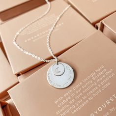 The big sister of our long-time favourite, Soren, the Saffron pendant combines the beauty of the stacked Soren with all the space of our beloved Charlotte. This leaves plenty of space for loved ones' names, birthdates or special text. Personalise with your text curved around the edge of the large pendant and an initial or symbol in the centre of the small pendant. The nature of the stacking pendants means the larger pendant will show wear from the smaller pendant rubbing against it. Crafted with Rectangle Necklace, Special Text, May Birthday, June Birthday, Oval Necklace, Symbol Necklace, July Birthday, Zodiac Necklaces, Gift Vouchers