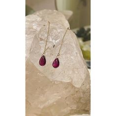 You shall need garnet drop earrings to make a statement with your look. These earrings create a sparkling, luxurious look featuring drop cut gemstone. If you love to gravitate towards unique styles, this piece of jewelry is perfect for you.   PRODUCT DETAILS :-  > Material - 18K Solid Yellow Gold > Gemstone - Garnet  > Gemstone shape - Drop  > Gemstone Weight - 3.5 ct > Gemstone pieces - 2  > Gemstone size - 9 x 6 mm > Gross Weight - 1.369 Grams > Setting - Drill setting > Length - 56 mm Elegant Garnet Briolette Earrings, Elegant Briolette Garnet Earrings, Fine Jewelry Gemstone Linear Earrings As Gift, Fine Jewelry Linear Gemstone Earrings, Teardrop Gemstone Linear Earrings As Gift, Ruby Teardrop Earrings Fine Jewelry, Teardrop Gemstone Linear Earrings For Gift, Faceted Garnet Drop Earrings, Garnet Teardrop Jewelry With Matching Earrings