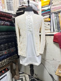 *3 Piece  White ,  Kurta, Pant, and Jacket  *Fabric: %100 Georgette, Satin, Thick, Warm, Comfortable, Breathable, Softer, Satin Feeling *Center Open  Jacket ,  With Zipper Fly Pants. *This Suit Has A 6" Drop Which Is The Difference Between The Size Of The Sherwani & Pants. For Example, A 40r Jacket Includes A 34W Pant *Dry Clean Only Important Note: All Our Products Are Made To Order ! Please Contact Us For Perfect Fitting Suit. .Full Lining Shrugs With Padding *We are proud to offer a wide rang White Semi-formal Sets With Long Sleeve, Semi-formal White Long Sleeve Sets, White Semi-formal Long Sleeve Sets, White Long Sleeve Semi-formal Sets, Traditional White Long Sleeve Suit, Beige Long Sleeve Semi-formal Set, White Embroidered Unstitched Suit With Long Sleeves, Traditional White Semi-formal Suit, Festive Fitted Off White Nehru Jacket