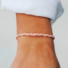 Our new Mini Braided bracelets are a delicate take on a classic style. Every bracelet is 100% waterproof. Go surf, snowboard, or even take a shower with them on. Wearing your bracelets every day only enhances the natural look and feel. Every bracelet is unique and hand-made therefore a slight variation in color combination may occur. White Braided Bracelets With Adjustable Length, White Braided Nylon Cord Bracelet With Adjustable Length, White Braided Bracelet With Adjustable Length, Casual White Braided Bracelets For Everyday, Adjustable Wristband For Friendship, Adjustable Hypoallergenic Friendship Bracelets, Casual Orange Braided Bracelets For Friendship, Casual Orange Braided Bracelet For Friendship, Casual Wristband As Gift