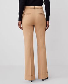 The versatile, streamlined look is back - our cuffed trouser pant is ultra flattering. Front zip with extended button tab closure. Front off-seam pockets. Back besom pockets.,Leg Shape:Leg Shape: Trouser – a pant with a bit of flare that lengthens legs,Rise:High rise: sits 1/2" to 1" below natural waist,Imported:Imported,Fit:Fit: Tailored & fitted,Length:Full length: 31 1/2" inseam with 22" leg opening,Fabrication:64% Polyester, 31% Viscose, 5% Elastane,Garment Care:Machine Washable The Cuffed Tab Waist Trouser by Ann Taylor Size regular - 18 Perfect Camel Women's Regular, Trouser, Pants, 64%, Polyester, 31%, Viscose, 5%, Elastane, Machine, Washable Best Dress Pants For Women, Women's Work Pants, Petite Work Pants, Womens Pant Suits, Womens Work Pants, Work Pants Women Office Wear, Casual Dress Pants Outfits, Comfy Business Casual, Business Casual Pants