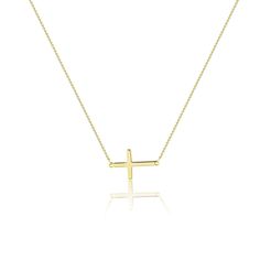 The dainty cross pendant necklace is a timeless classic that every woman needs in her jewelry collection. This necklace is the perfect accessory for any outfit, adding a touch of elegance and sophistication. The adjustable length allows for a personalized fit, ensuring comfort throughout the day. Crafted from high-qual Elegant Cross Necklace With Adjustable Chain, Minimalist Clavicle Chain Necklace With Cross Pendant, Classic Clavicle Chain Necklace With Cross Pendant, Classic Cross Pendant Clavicle Necklace, Classic Cross Clavicle Chain Necklace, Everyday Minimalist Cross Pendant Necklace, Minimalist Daily Wear Cross Pendant Necklace, Minimalist Everyday Cross Necklace, Simple Necklace With Delicate Chain And Cross Pendant