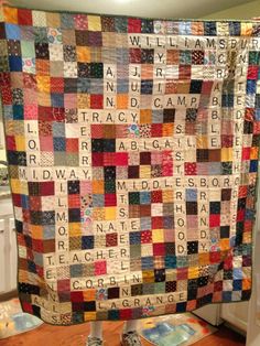 a large quilt with words written on it