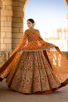 Orange Lehenga Choli and Dupatta Pakistani Bridal Dress is a traditional attire that will give you a head-turning dreamy look on the big day. Tilla, sequins, and goldwork give a glamorous touch to this perfectly stitched Bridal Lehenga Choli in premium quality fabric. Bridal Choli: The choli in an alluring orange shade has premium fabric. This beautiful choli is adorned with hand-crafted details of zardosi, sequins, and tilla. Naqshi and goldwork give a graceful finishing look to this choli, mak Latest Bridal Lehenga Designs, Orange Lehenga, Chic Prom Dresses, Pakistani Bridal Dress, Bridal Lehenga Designs, Latest Bridal Lehenga, Bridal Dupatta, Wedding Lehenga Designs, Indian Bride Outfits