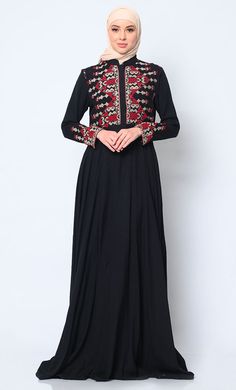 Discover the perfect fusion of elegance and practicality with our Women's Abaya, meticulously crafted to elevate your wardrobe. Featuring modern cross stitch embroidery on the bodice, this abaya exudes sophistication and timeless charm. The addition of two discreet pockets ensures functionality without compromising on style, providing ample space to keep essentials close at hand. Designed for effortless sophistication, a hidden button placket maintains a clean, streamlined front, while waist gathers create a graceful drape that enhances the figure beautifully. A refined stand collar completes the look with understated elegance, framing the face with finesse. Crafted from premium fabric, this abaya promises luxurious comfort and versatility, making it an essential piece for both formal occa Traditional Long-sleeve Abaya With Intricate Embroidery, Traditional Long Sleeve Abaya With Resham Embroidery, Traditional Maxi Abaya With Floral Embroidery, Traditional Long Sleeve Abaya With Intricate Embroidery, Traditional Abaya With Intricate Embroidery And Long Sleeves, Traditional Resham Embroidery Abaya, Fitted Long Sleeve Abaya With Dabka Work, Traditional Black Embroidered Thobe, Traditional Long Abaya With Chikankari Embroidery