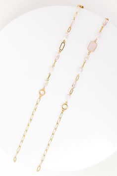 - Sparkle and inspire with this glamorous necklace! Its long shimmering design can elevate even the most simple look to keep you in the spotlight. - Gold colored metal material - A long chain patterned iridescent beading, circular gold pendants, and a single faceted stone pendant - An adjustable length chain and clasp closure - Size: 38-40 inches Glam Necklace, Gold Pendants, In The Spotlight, Long Chain, Metal Material, Stone Pendant, Stone Pendants, Gold Pendant, Gold Color