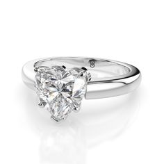 This beautiful heart cut engagement ring features a minimalist fully polished plain aesthetic. The beautiful center stone stands proudly. Optional matching band is available. Band features a notch at the top to sit flush with the main ring. 2.00 carat center stone shown. This ring is made to order. Please select your options and allow 2-3 weeks for delivery. Plain Band Engagement Ring, Plain Aesthetic, Heart Cut Engagement Ring, Heart Engagement, Wedding Day Jewelry, Heart Engagement Rings, Diamond Guide, Plain Bands, Band Engagement Ring