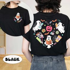 Teacher Halloween Shirt, Spooky Teacher Shirt, Custom Teacher Name Shirt, Cute Halloween Shirt, Teacher Halloween Gift, Kindergarten Teacher ↓ Click here to view our additional fashionable collections ↓ https://handcraftedbyhelenn.etsy.com Product Details: - 100% Cotton (fiber content may vary for different colors) - Medium fabric (5.3 oz/yd2 (180 g/m2)) - Classic fit - Tear away label - Runs true to size Care instructions: - Machine wash: warm (max 40C or 105F); - Non-chlorine: bleach as needed Cute Black Short Sleeve Shirt, Spooky Black T-shirt With Funny Print, Black Spooky T-shirt With Funny Print, Black Cotton Shirt For Halloween, Black Halloween Shirt With Character Print, Spooky Black Short Sleeve Shirt, Black Horror Shirt For Halloween, Spooky Black Tops For Costume Party, Black Short Sleeve Spooky Shirt