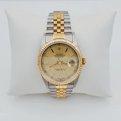 Men's Rolex 36mm DateJust 18K Gold / Stainless Steel Two-Tone Watch with Champaign Dial and Fluted Bezel. UNWORN SN# U98**** Year: 1998. Brand: Rolex. Gender: Men's. Crystal: Plastic. Case Back: Solid. Condition: Unworn. Dial Color: Champaign. Model: DateJust 16233. Case Dimensions: 36mm. Bezel Color: 18K Yellow Gold. Movement: Mechanical (Automatic). Metal Type: 18K Gold / Stainless Steel. Bracelet / Strap: 18K Yellow Gold / Stainless Steel. Box / Certificate: Rolex Box / Certificate of Authent Anniversary White Gold Watch Band, Formal Diamond Watch With Date Display, Timeless Yellow Gold Watches With Date Display, Timeless Gold Watch Band With Date Indicator, Luxury Diamond Watch With Date Display For Formal Events, Gold Watch Bands With Date Display For Formal Occasions, Classic Gold Diamond Watch With Date Display, Classic Yellow Gold Watch Accessories With Date Display, Classic Gold Watch Bands With Date Indicator