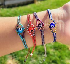 Such a cute Evil Eye bracelets, Good Vibes bracelets, Protection Beaded and woven bracelets, Friendship besties bracelets, Adjustable waterproof bracelets, Macrame Bracelets, Unique Gift, Tropical Summer Beachy Bracelets. Excellent as a unique gift for friends, sister, wife, mother, daughter, teacher or any lady in your life! DETAILS: ▪️ Materials: Brazilian waterproof thread, multicolor evil eye glass beads. ▪️Size: 6 Inches when fully closed end 11 Inches when fully open, It's made adjustable so it will fit you just perfectly! ▪️ Handmade Items. ▪️Your jewelry arrives packaged ready to gift  If you're looking for some specific sizes please feel free to send me a message. Before purchasing please check out carefully all pictures. What you see what you will have. If you have any question p Bohemian Friendship Bracelets With Evil Eye, Bohemian Braided Bracelet With Evil Eye For Friendship, Bohemian Handmade Evil Eye Bracelet For Festivals, Handmade Multicolor Evil Eye Festival Bracelet, Handmade Multicolor Evil Eye Bracelet For Festival, Bohemian Evil Eye Bracelet For Friendship, Evil Eye Round Beads Friendship Bracelets For Festival, Bohemian Multicolor Evil Eye Bracelet For Festivals, Festival Evil Eye Friendship Bracelets With Round Beads