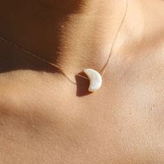 Crescent Moon Pearl Necklace – Cashmere Cactus White Moon Phase Necklace, Elegant White Moon-shaped Necklace, White Moon-shaped Clavicle Necklace, Dainty White Moon-shaped Jewelry, Everyday White Jewelry With Moon Charm, Everyday White Moon Charm Jewelry, White Dainty Jewelry With Moon Charm, White Sterling Silver Necklace With Moon Charm, Dainty White Necklace With Moon Charm