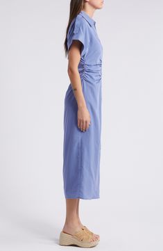 Elegant ruching defines the waist of a refined shirtdress built with clean lines and simple details to offer minimalist charm. 51 1/2" length (size medium) Front button closure Spread collar Short sleeves 65% rayon, 26% nylon, 9% elastane Hand wash, line dry Imported Blue Mid-length Dress With Button Closure, Fitted Midi-length Shirt Dress With Placket, Blue Knee-length Shirt Dress With Placket, Blue Chambray Button-up Dress, Button-up Chambray Dress In Medium Wash, Short Sleeves, Nordstrom, Collar, Blue