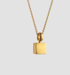 This small suitcase pendant hangs close to your neck. It can also sit on it's own, on the shelf, as though it had just come back from a journey. Materials: 22 karat gold. Pendant total length (include the bail): 12.7 mm. Cube width and length: 6.5 X 6.5 mm Inner diameter of the link: 3 mm. We can make it larger at your request. Whether around the neck, close to the heart, or lower - our pendants always hang close, rocking with us as we move. Their balance point is our balancing point. SHIPPING E Timeless Charm Necklace As A Gift, Formal Square Pendant Necklace With Polished Finish, Timeless Charm Necklace For Gifts, Gift Necklace With Polished Finish And Rectangular Pendant, Modern Rectangular Necklace With Polished Finish, Rectangular Necklace With Polished Finish For Formal Occasions, Formal Rectangular Necklace With Polished Finish, Modern Necklace With Rectangular Pendant And Box Chain, Classic Square Pendant Necklace With Polished Finish