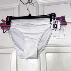 This Route 101 Sport Bikini Bottom Is Brand New With The Original Tag And With The Protective Panty Liner Still Inside.Size Lg Feel Free To Bundle With Matching Items White Stretch Bottoms For Pool, White Stretch Swimming Bottoms, Sporty White Swimwear For Beach Season, White Brief Bottoms For Poolside, Sporty Fitted White Swimwear, White Fitted Sporty Swimwear, White Stretch Swimwear For Sports, Stretch White Swimwear For Sports, White Stretch Brief Swimwear