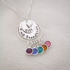 "Personalized Grandma Necklace, Grandmother Necklace, Birthstone Necklace, Love my Grandchildren Necklace, Hand Stamped, Mother's Day Gift This is a perfect Mother's Day Gift for Grandma to show off all of her children or grandchildren. A sterling silver pendant of stacked discs are hammered and hand stamped with her special grandmother name and then bottom disc can be stamped with a special message. A tiny sterling silver heart charm adorns the top of the disc. A sterling silver ring holds all Mother's Day Name Birthstone Necklace With Round Pendant, Mother's Day Round Pendant Birthstone Necklace With Name, Mother's Day Birthstone Necklace With Name On Round Pendant, Nickel-free Necklace For Mother's Day Personalized Gift, Adjustable Nickel-free Birthstone Necklace For Birthday, Multicolor Jewelry For Valentine's Day Birthday, Multicolor Birthday Jewelry With Charms, Multicolor Charm Jewelry For Birthday, Multicolor Charms Jewelry For Birthday