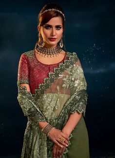 Green Festive Saree Embellished Anarkali Salwar Kameez In Pista Green, Embellished Pista Green Anarkali Salwar Kameez, Embellished Chanderi Saree For Navratri, Green Embellished Designer Traditional Wear, Embellished Pista Green Traditional Wear For Eid, Festive Green Embellished Dupatta, Unstitched Green Embellished Traditional Wear, Festive Chanderi Embellished Saree, Semi-stitched Green Embellished Traditional Wear