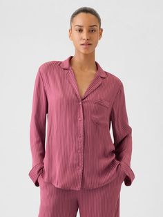 Soft satin pajama shirt.  Notch collar, button front.  Long sleeves.  Patch pocket at chest.  Certain styles have allover prints.  Fit: Over Casual Collared Top For Pajama Party, Gap Summer Tops With Spread Collar, Button Closure Top For Pajama Party In Spring, Relaxed Fit Button-up Sleepwear, Casual Button-up Sleep Tops, Pink Button-up Shirt For Loungewear, Casual Summer Sleepwear By Gap, Collared Shirt For Loungewear In Fall, Collared Shirt For Fall Loungewear