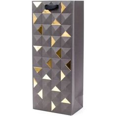 a gray and gold gift bag with pyramids on it