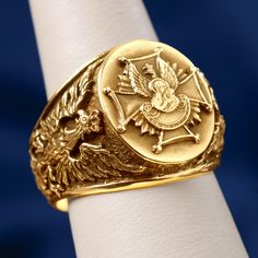 The design of this ring has the Historic Polish White Eagle engraved on either side of the ring. The top design is an image of Our Lady of Czestochowa (Matka Boska Czestochowska) in front of Independence Eagle on top of the Scouts Badge. 14K Yellow Gold Ring face measures 0.562" x 0.687" Made in Poland Packaged in gift jewelry box. Gold prices fluctuate often. What you see online is today's price. Diamond Intaglio Rings, Fine Jewelry, Diamond Intaglio Fine Jewelry Rings, Diamond Intaglio Jewelry, Round Diamond Intaglio Jewelry, Luxury Polished Snake Ring For Anniversary, Luxury Intaglio Rings For Anniversary, Symbolic Formal Signet Ring With Polished Finish, Symbolic Formal Signet Ring Hallmarked, Symbolic Hallmarked Signet Ring For Formal Occasions