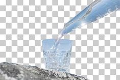 an ice bucket pouring water into a glass on top of a rock png clipart