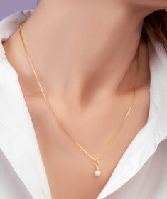 This freshwater pearl gold necklace is the epitome of timeless elegance. The necklace features a delicate chain made of high-quality gold, expertly crafted to provide durability and longevity. The centerpiece of the necklace is a stunning freshwater pearl, which shimmers with every movement. The freshwater pearl is carefully selected for its luster and beauty, making each necklace unique. The pearl is expertly set in high-quality gold, ensuring that it remains secure and safe. The delicate chain Elegant Gold Chain Necklace With Pearl Drop, Gold-plated Chain Necklace With Pearl Drop, Gold-plated Chain Necklace With Pearl Charm, Gold Pendant Chain Necklace With Pearl Drop, Gold Plated Chain Necklace With Pearl Charm, Elegant Gold Plated Gold Pearl Necklace, Gold Akoya Pearl Necklace, Gold Plated Pearl Necklace With Pearl Charm, Gold Pearl Necklace With Pearl Pendant