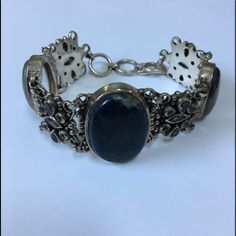 This Bracelet Is Filled With Gemstone Treasures. A Large Agate In The Center, Two Rutialted Quartz On The Sides And Variety Of Stones Used In The Design Separating The Main Stones. The Toggle Clasp Makes To Adjustable From 7 1/4” To 9”. The Total Weight On This Piece Is Am Amazing 97.2g Or 3.43oz. As With All My Listings, Unless Otherwise Stated, This Is New Never. Thank You For Your Interest. Copper Cuff Bracelet, Wide Cuff Bracelets, Amethyst Color, Gorgeous Bracelet, Rhinestone Bracelet, Rutilated Quartz, Silver Cuff Bracelet, Beaded Stretch Bracelet, Toggle Clasp