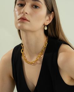 Meet the Kate Chain Necklace—your new go-to for bold elegance. With its striking gold-tone links, this piece transforms any outfit from simple to stunning. Perfect for layering or as a standout solo piece, it’s your ticket to instant glamour. 18k gold over sterling silver Approx. length: 18" Our gold covering on silver is a thick layer of 18k solid gold on sterling silver meaning it will last longer. You get the look and feel of gold jewelry at a fraction of the price. Silver Meaning, Get The Look, Solid Gold, Gold Jewelry, Layering, Chain Necklace, 18k Gold, Gold Tones, Sterling Silver